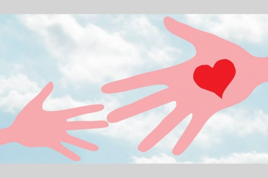 Obrazek przedstawiający dwie dłonie, na jednej jest narysowane serce.